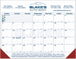 Main image of the custom printed desk pad calendar featuring a blue grid layout and premium leatherette corners.